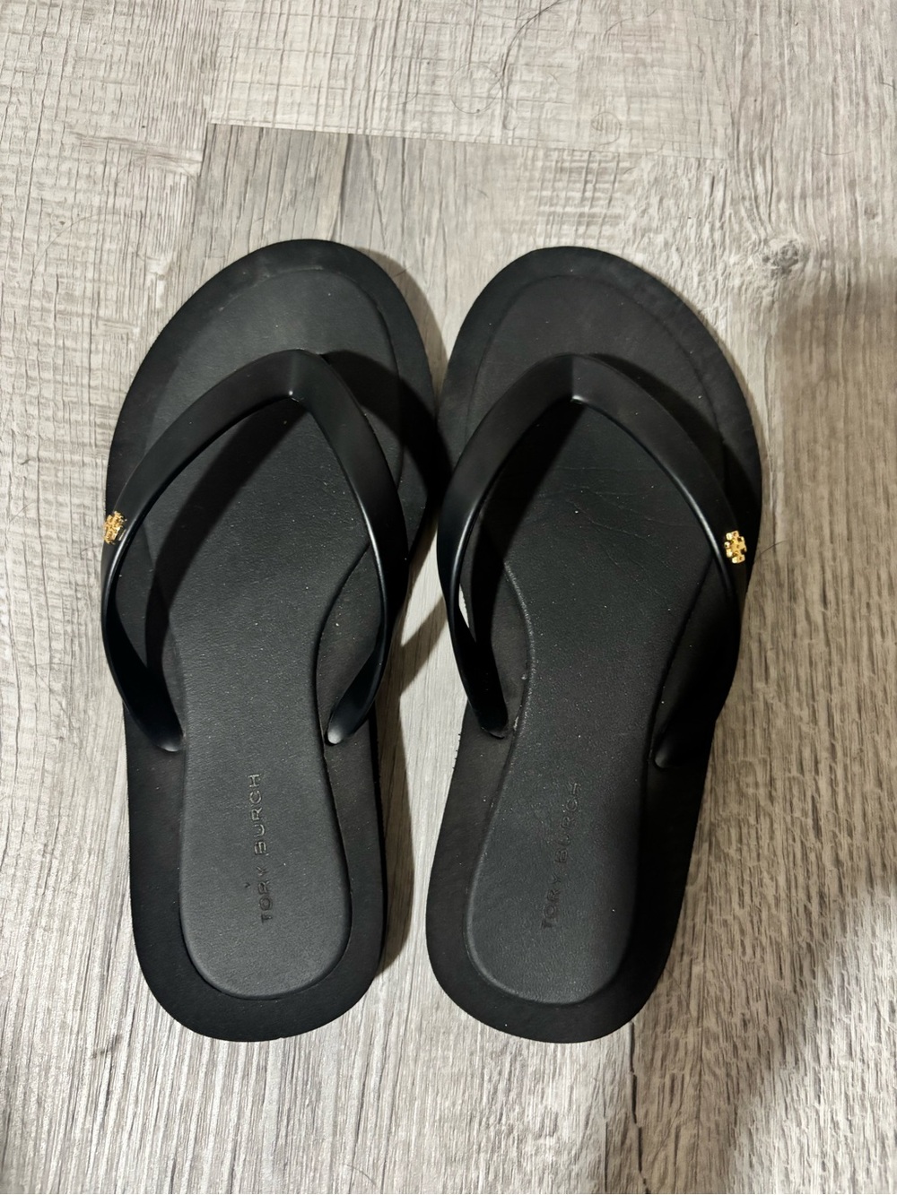 Tory Burch Black Flip Flop Sandals with Gold Logo Accent